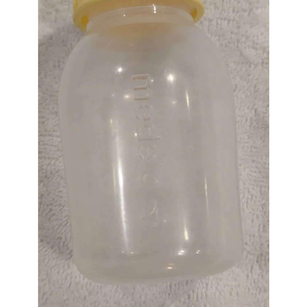 10 Baby Medela Clear and Yellow Breast Milk Storage Bottles